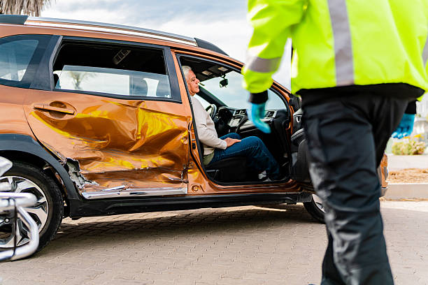 Auto accident scene with damaged vehicles and emergency response